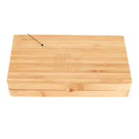 a bamboo cutting board with an arrow on it
