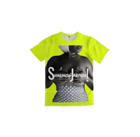 a yellow t - shirt with an image of a woman in a bikini