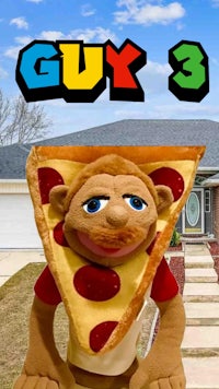 a stuffed monkey holding a pizza in front of a house