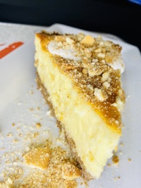 a slice of cheesecake on a white plate