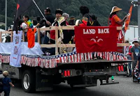 the back of a truck with people on it