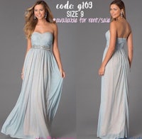 a woman wearing a blue prom dress