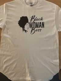 a white t - shirt that says black woman boss