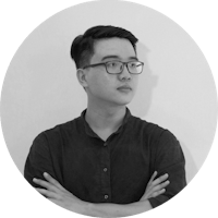 a black and white photo of a man with glasses