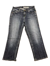 a pair of women's jeans on a black background