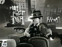 a black and white picture of a man in a hat