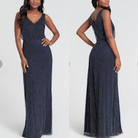 the back view of a woman in a navy gown