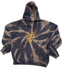 a tie dye hoodie with a yellow logo on it