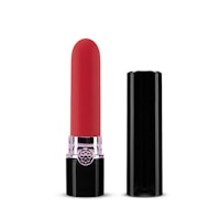 a red lipstick on a white background