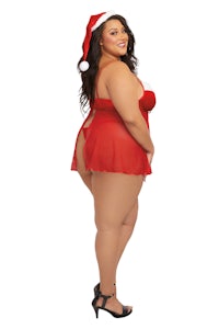 a plus size woman wearing a santa claus hat