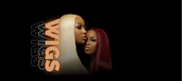 a black background with the word wigs on it