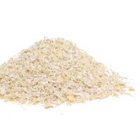 a pile of oats on a white background