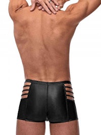 the back view of a man wearing black leather shorts