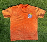 an orange t - shirt with a blue star on it