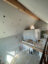 a room with a ceiling that is being remodeled