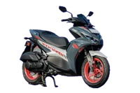 a grey and red motorcycle is parked against a black background