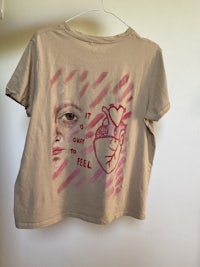 a t - shirt with an image of a woman's face on it