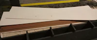 a white sheet of paper is sitting on a table in a factory