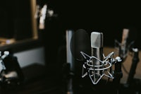 a microphone is sitting on a table in a recording studio