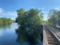 a railroad bridge over a body of water