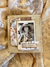 a photo of a woman in a hat on a piece of fabric