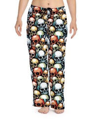 a woman wearing a skull print pajama pants
