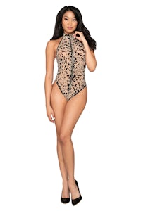 a woman wearing a leopard print bodysuit