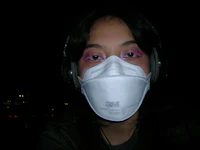 a woman wearing a face mask