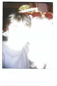 polaroid photo of a man and a woman