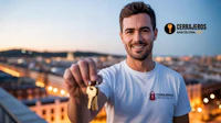 a man holding a key to his apartment in barcelona