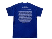 a blue t - shirt with a message on it
