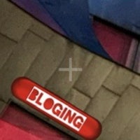 a picture of a red and blue sign with the word blogging on it