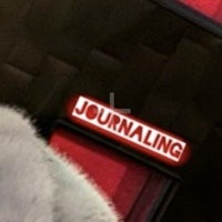 a stuffed animal with the word journaling on it