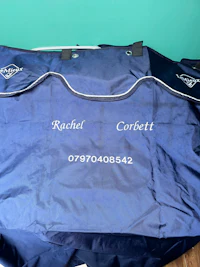 a blue and white bag with a logo on it