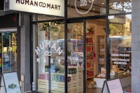 a store with a sign that says humanomart