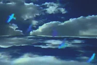 a blue sky with clouds in the background