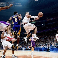 a basketball player in the air