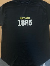 a black t - shirt with the word julyth on it
