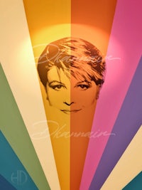 a portrait of a woman with a colorful background