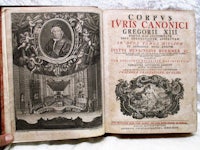 an old book with a picture of a man and a woman
