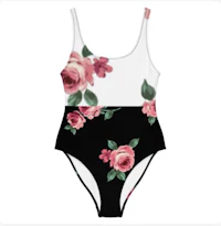 a black and white one piece swimsuit with roses on it