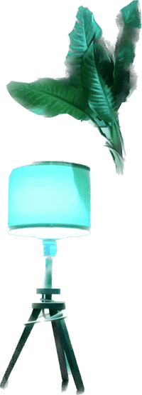a table lamp with a green leaf on it