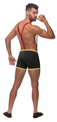 a man in a black and red suspenders is posing