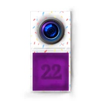 a purple camera with confetti sprinkles on it
