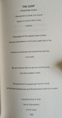 an open book with a pencil in it