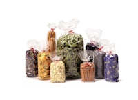 a group of bags with different types of dried herbs