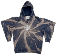 a tie dye hoodie with a black and white design