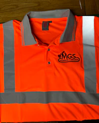 an orange polo shirt with reflective tape on it