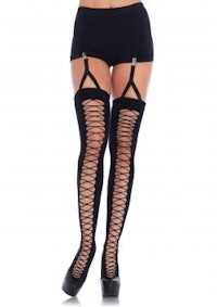 a woman wearing black thigh high stockings