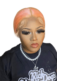 a woman with pink hair wearing a t - shirt